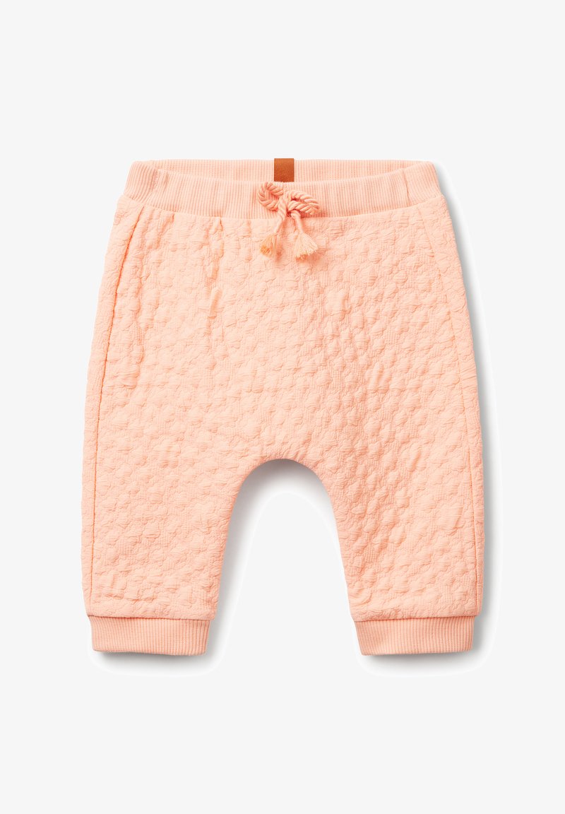 Pantalons de survêtement de couleur pêche avec une surface texturée, une taille élastique, un cordon de serrage et des poignets côtelés. Comprend des poches latérales.