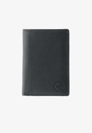 Black textured leather passport holder with embossed logo of a bird in a circle on the bottom right corner.