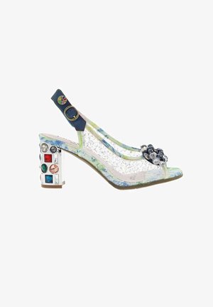 Escarpin à bride arrière avec bout ouvert, empeigne transparente à motif floral, bride à boucle bleu marine, talon épais orné de pierres précieuses et décoration florale foncée sur le bout.