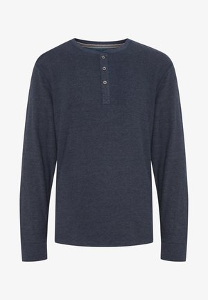 Mornarica dug rukav henley majica s tri dugmeta, izrađena od teksturiranog materijala, koja ima okrugli izrez i rukave s manžetama.