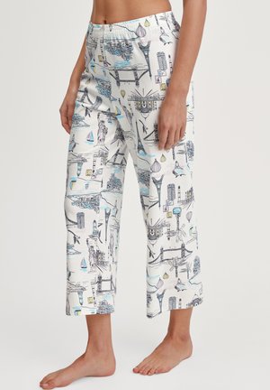 Katoenen pyjamabroek met een witte achtergrond en een kleurrijk stadsbeeldprint. Het ontwerp bevat iconische bezienswaardigheden in blauw, paars en zwart.