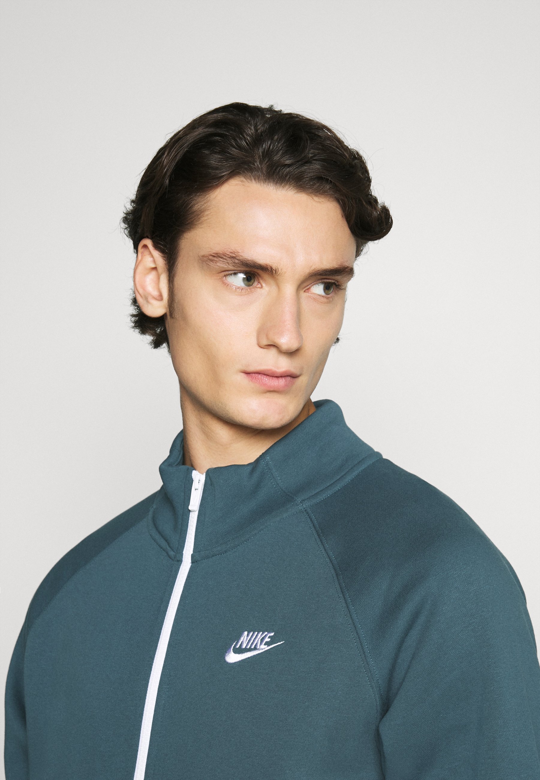 nike green and white tracksuit