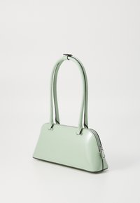 Mint green patent leather handbag with a triangular shape, two handles, and silver-tone hardware accents. Zipper closure at the top.