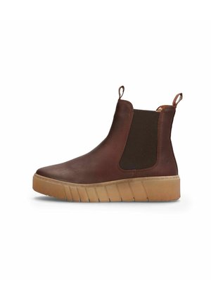 Botte Chelsea en cuir marron avec des panneaux latéraux élastiques foncés et une semelle en caoutchouc beige avec des languettes à l'avant et à l'arrière.