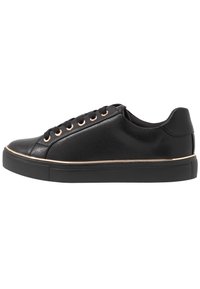 Black leather sneaker with round toe, textured upper, and rose gold accents. Features flat laces, a cushioned collar, and a rubber sole.