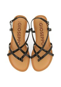 Sandali neri in pelle con cinturini incrociati, dotati di una soletta in pelle color cuoio e di una cinghia alla caviglia regolabile. Suola piatta con design minimalista.