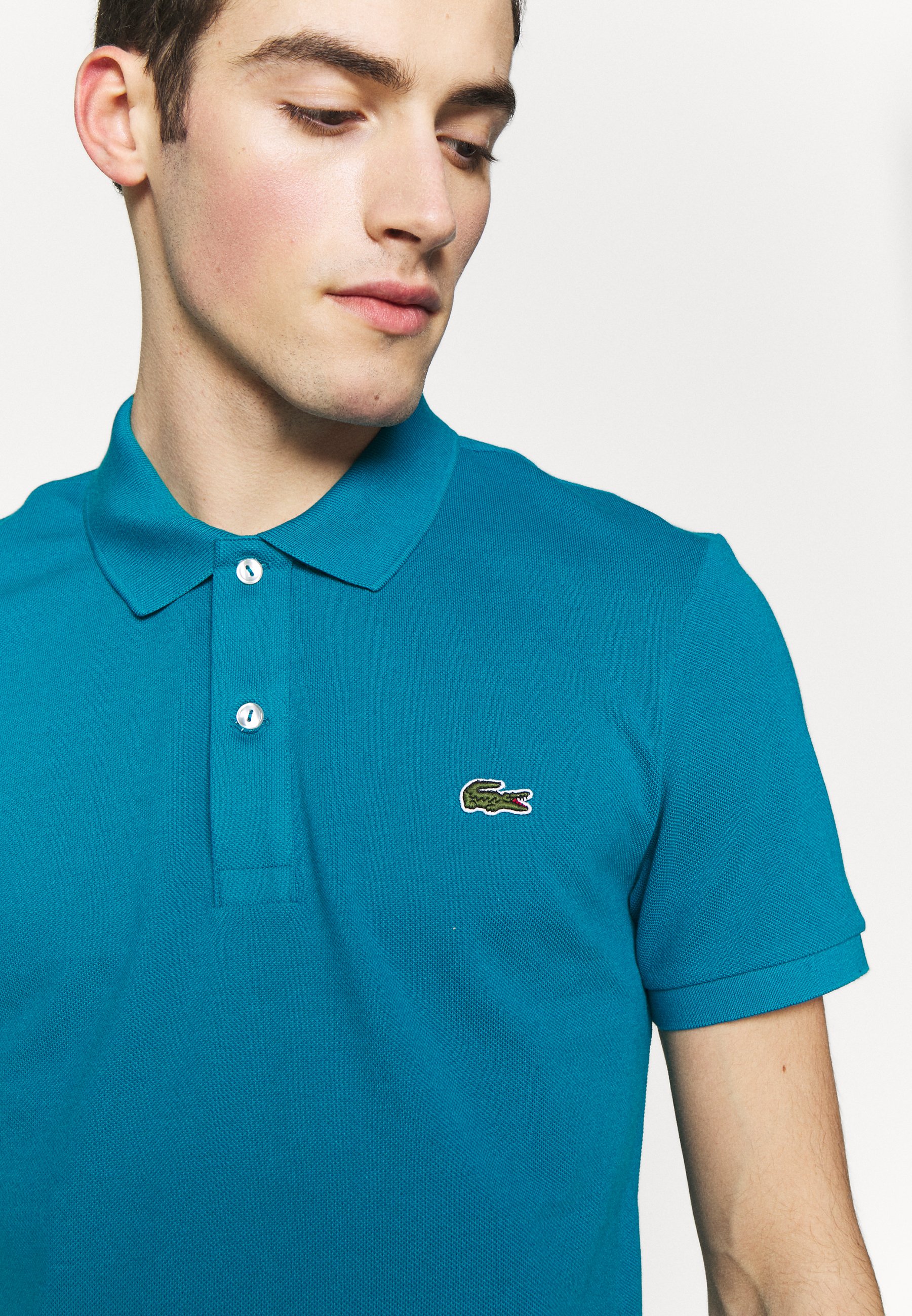 teal lacoste shirt