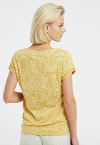 Protest PRTELLES 23 - T-shirts print - tumericyellow