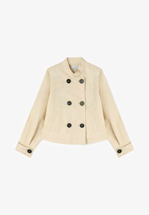 Beige croppet jakke med høj krave, seks sorte knapper foran, to sidelommer og manchetter med knapper på de lange ærmer.