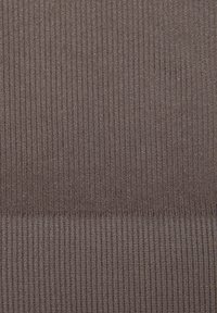 Textured fabric in a deep brown color features vertical ribbing pattern, creating a visually interesting surface with subtle sheen.