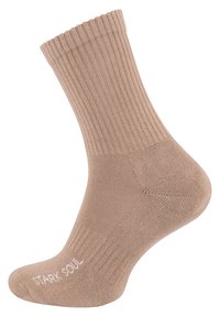 Calza beige a coste con bordo scallop, realizzata in tessuto morbido. Presenta un tallone e una punta rinforzati, con la scritta "STARK SOUL" stampata in bianco.