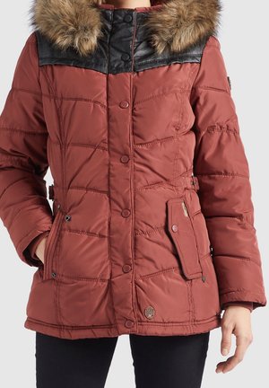 Red quilted puffer jacket with black leather shoulder accent, removable faux fur hood, buttoned front, and two front pockets.