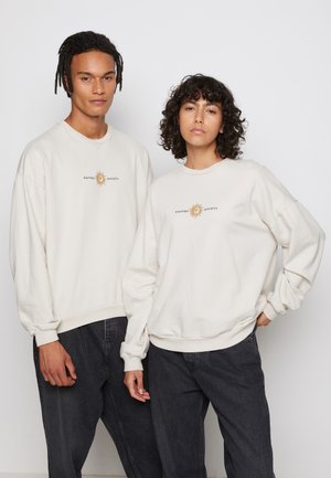CREW WASHED SUN - Pusa - beige
