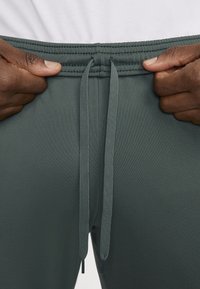 Nike Performance DRI-FIT ACADEMY PANT - Træningsbukser - vintage green black black white
