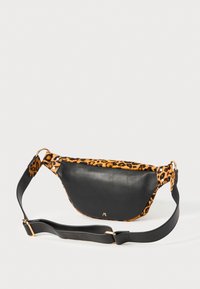 Black leather and leopard print crossbody bag with adjustable strap and small gold logo on front center.