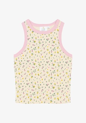 Csíkos ujjatlan felső világos krém színben, rózsaszín nyakkivágási akcentusokkal. Virágmintázattal rendelkezik, sárga és rózsaszín virágokkal, zöld szár háttérrel.