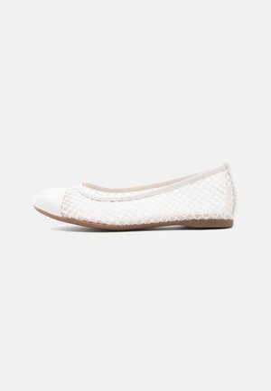 White ballet flats with a textured mesh upper and solid white cap toe. Features a low profile and a flexible, brown rubber sole.