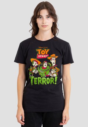 Black cotton t-shirt featuring a colorful "Toy Story" graphic with characters and the text "of TERROR!" in green. Short sleeves and crew neck design.
