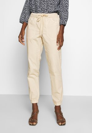UTILITY TRACK PANTS - Trousers - sand beige