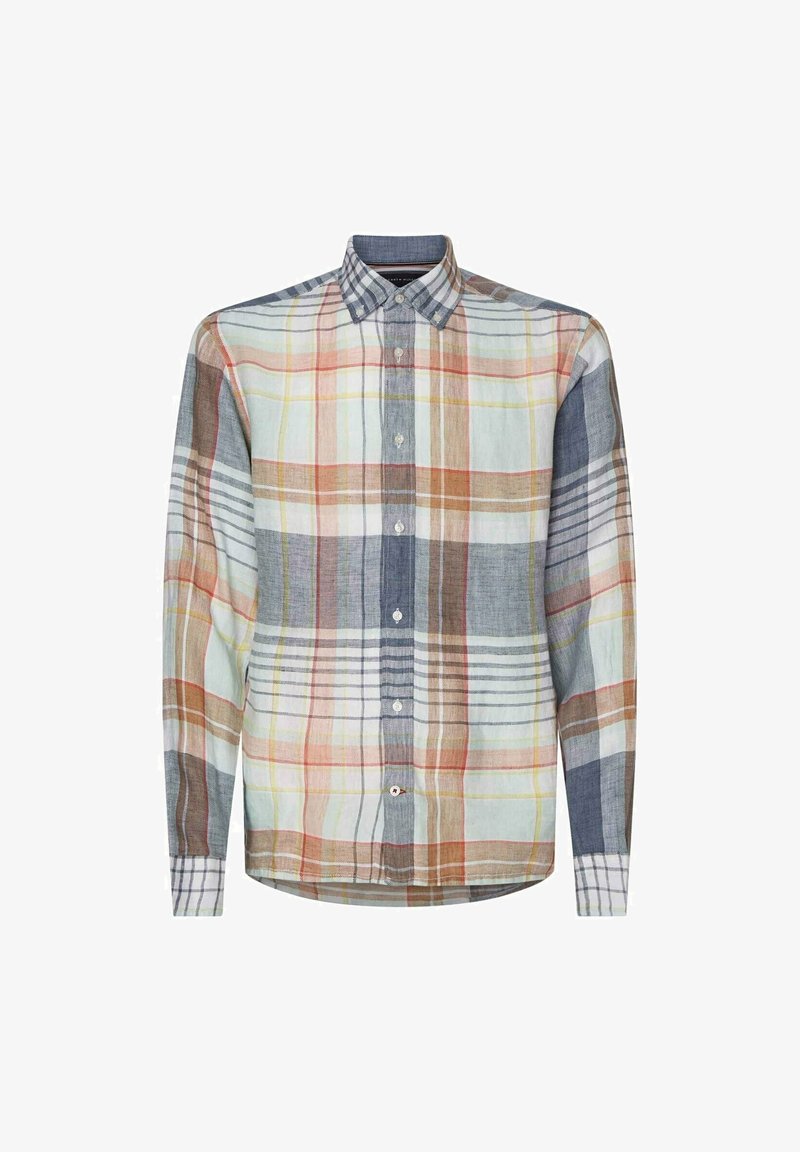 Chemise à manches longues boutonnée avec un grand motif à carreaux multicolore dans des tons de bleu, marron, rouge et jaune sur fond blanc.