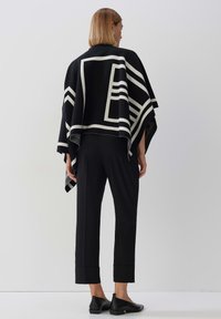 someday. BENUKI - Poncho - black