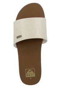 Sandale brune à glissière avec une sangle texturée blanche et un petit logo "Reef" en métal, taille 8, vue de dessus sur un fond blanc.