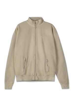 Μπεζ φούτερ με φερμουάρ φτιαγμένο από μαλακό ύφασμα, με ψηλό γιακά, διαθέτοντας δύο μπροστινές τσέπες με φερμουάρ και ριμπ μανσέτες και στρίφωμα.