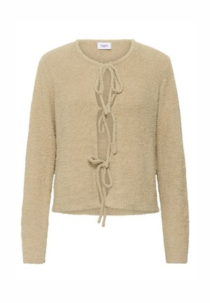 Bēša pūkaina džempera ar apaļu izgriezumu, garām piedurknēm un priekšējo saitīšanu. Audums ar tekstūrētu un mīkstu, pūkainu izskatu.