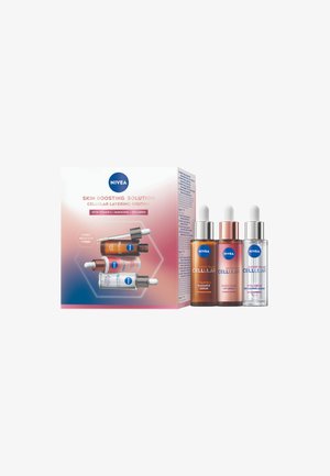 NIVEA Skin Boosting Solution box featuring three serums: clear glass bottles with droppers, colored fluids in bronze, pink, and clear.