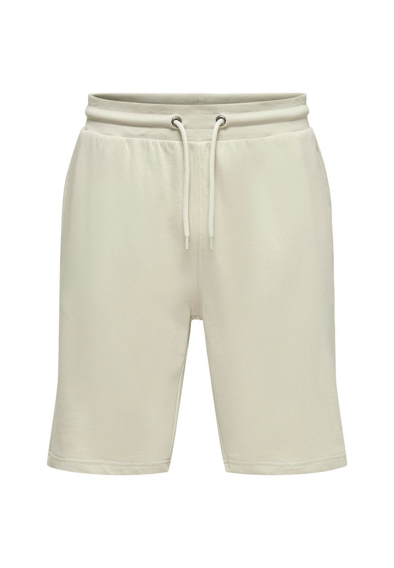 Pantalones cortos beige claro hechos de una tela suave, con cinturilla elástica y cordón, y bolsillos laterales, de longitud estándar hasta la rodilla.