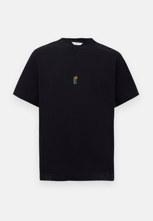 Black cotton t-shirt featuring a small embroidered design of a building with a sun. Classic crew neckline and short sleeves.