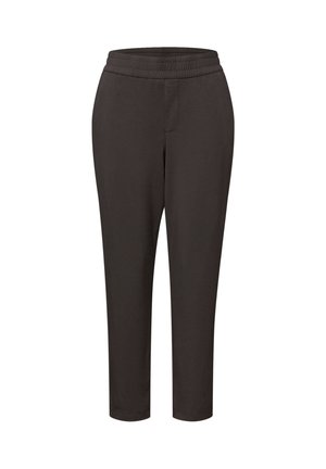 Pantalon noir fuselé avec taille élastique, devant plat et ourlet à la cheville.