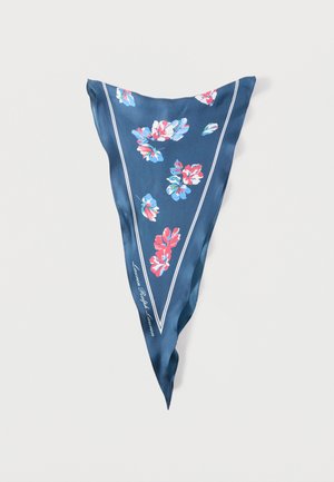 Triangular navy silk scarf with red, white, and blue floral patterns and thin white border lines, folded on a white background.