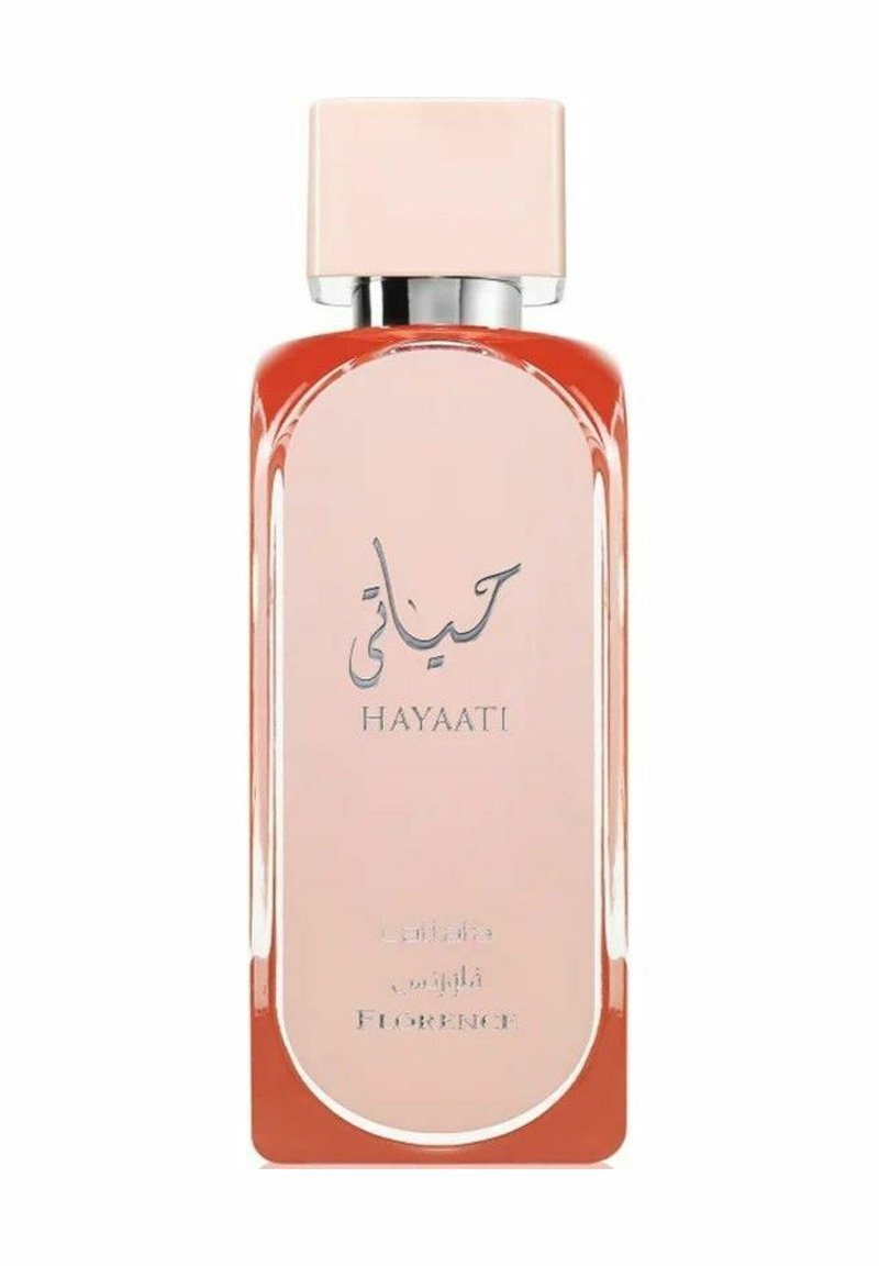 HAYAATI haju pullo on suorakulmainen lasimuotoilu, jossa on liukuvärjätty oranssi pohja ja vaaleanpunainen korkki. Hopeiset tekstit arabialaisilla ja englanninkielisillä merkeillä.