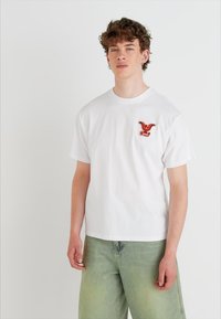 Levi's® VINTAGE FIT GRAPHIC - Marškinėliai su spaudiniu - bi eagle white