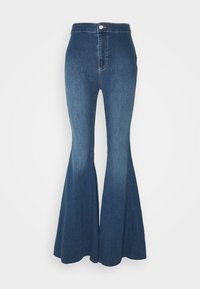 Högmidjade utsvängda jeans i en medelblå denim, med fickor, knäppning och en slät yta med lätt blekta detaljer.