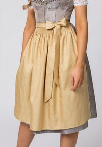Traditional dress featuring a golden skirt with a textured floral pattern, cinched waist, and a matching bow, complemented by a light blue bodice.