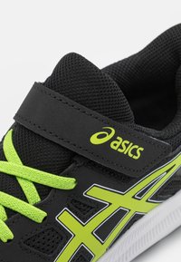 ASICS JOLT 4 UNISEX - Road running shoes - black/lime zest