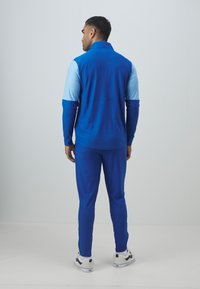 Under Armour CHALLENGER - Tuta - tech blue/white