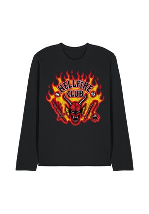 Black long-sleeve shirt with red and yellow flames, a red horned demon head, and text "Hellfire Club" surrounded by dice and medieval weapons.