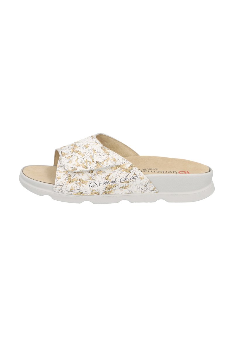 White slide sandals featuring a floral pattern in beige and yellow, soft beige insole, and a cushioned white rubber outsole.