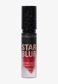Flytande läppstift i en klar cylindrisk tub med ett svart glittrande lock. Har en etikett med texten "Star Blur" i en gradient från svart till röd.