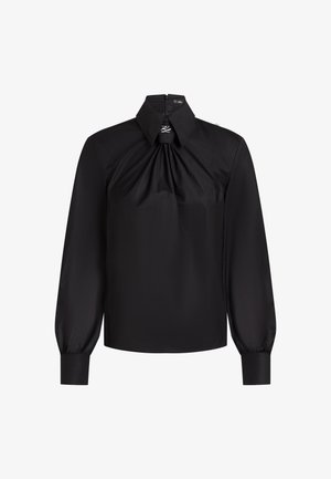 Schwarze Bluse mit strukturiertem Kragen, langen Puffärmel und einem gerafften Frontdetail. Hergestellt aus glattem, leichtem Stoff mit einem Reißverschluss.