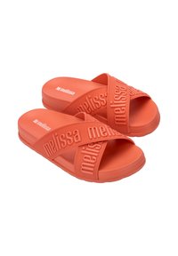 Infradito corallo in gomma molde per una vestibilità comoda; presentano una fascia testurizzata con il marchio "melissa"; design minimalista con suola piatta.