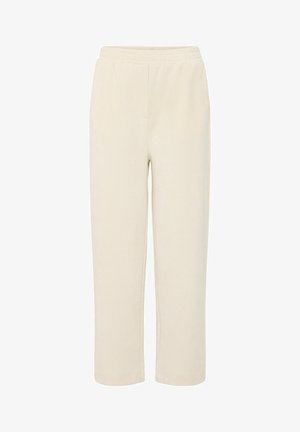 Pantalons de survêtement beiges avec une taille élastique, coupe droite et texture douce, présentant des coutures minimales et sans embellissements visibles.