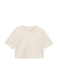 Veste courte à manches courtes couleur blanc cassé, en tissu texturé et duveteux, avec un col arrondi et une fermeture à boutons à l'avant.