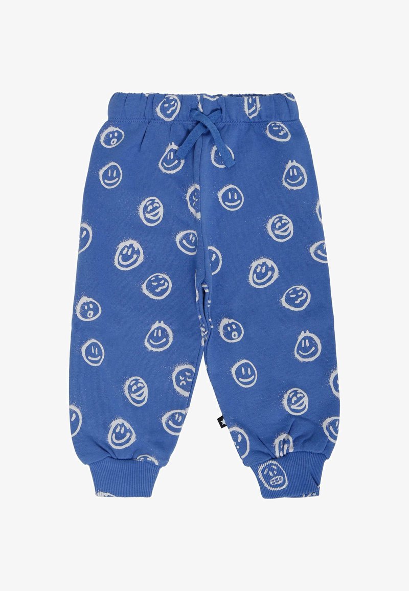Blauwe katoenen sweatpants met een elastische tailleband, voorzien van een willekeurig patroon van witte glimlachende gezichtjes. Inclusief manchetboorden en een trekkoorddetail.