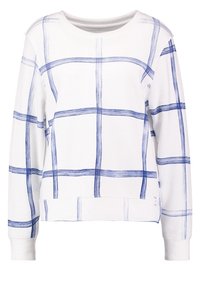Sudadera blanca con patrón de cuadros azules, cuello redondo, mangas largas y dobladillo y puños acanalados. Hecha de una tela suave y texturizada.