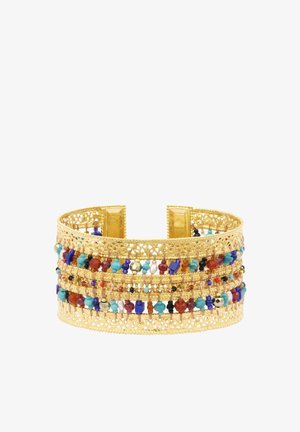 Large bracelet manchette en filigrane dorée avec plusieurs rangées de petites perles colorées rouge, bleu, turquoise, blanc et noir.