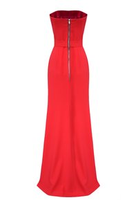 Czerwona wieczorowa sukienka bez ramiączek z dopasowanym gorsetem, prostym krojem i zamek błyskawiczny z przodu. Gładki materiał o lekko połyskującej powierzchni.